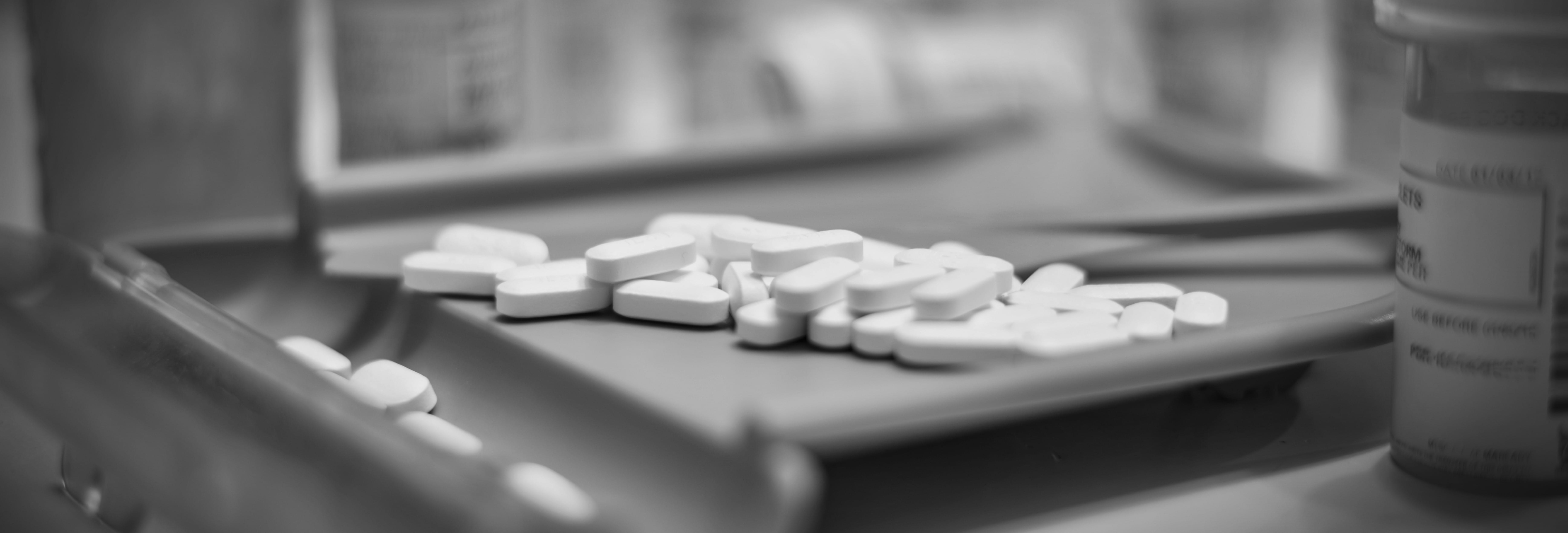 Pile of unsorted pills on a counting tray